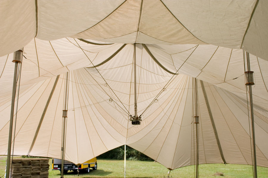 The five-cone tent has a suspended center pole.